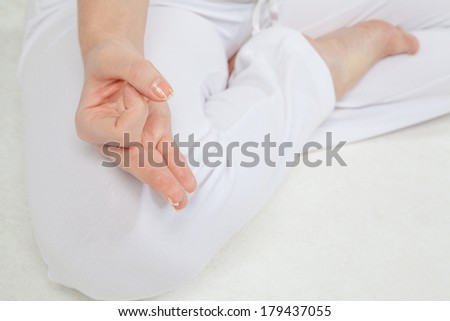 Yoga meditation in lotus pose with hands in gyan mudra