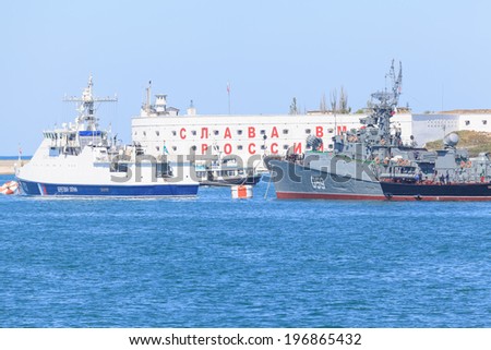 SEVASTOPOL, CRIMEA - MAY 7, 2014: Ships of Russian Navy Black Sea Fleet prepare for a Victory Day parade in Sevastopol