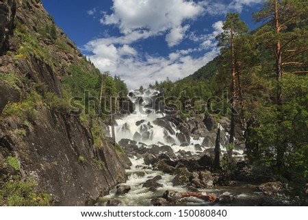 The biggest waterfall of Altai in the deep canyon of Tschultscha river