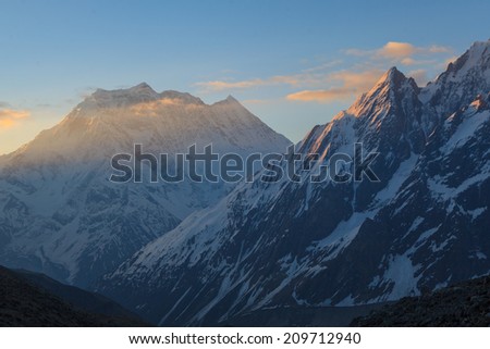 Dark valley and snow peak of Samdo shot from high Larke Pass  just before sunrise