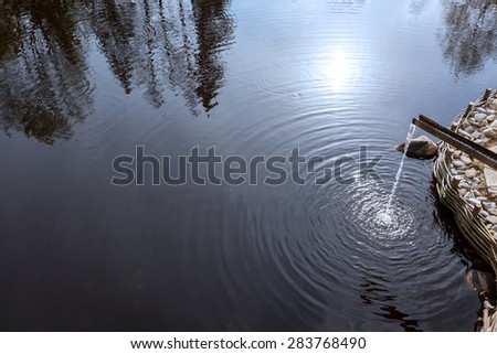 a jet of water, the water in the trough, Lake, reflections of trees, water, background, abstract, splashing, splash, surface, clean, wet, black, stream
