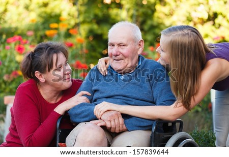 The Female Generation Visiting Old Grandfather At The Nursing Home.