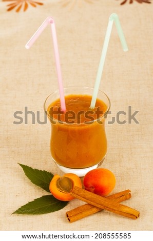 Tasty summer drink - apricot shake with cinnamon.