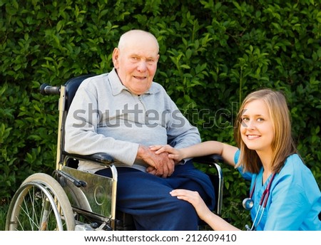 Kind doctor helping patient with Alzheimer\'s disease.