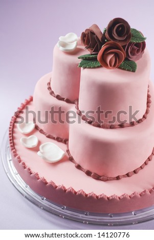 stock photo Fondant wedding cake with gumpaste roses