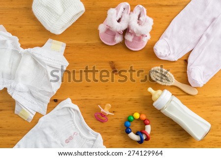 Collection of items for babies shot from above. Ideal website hero or header image