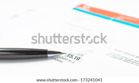 Bill to pay with amount circled with black pen