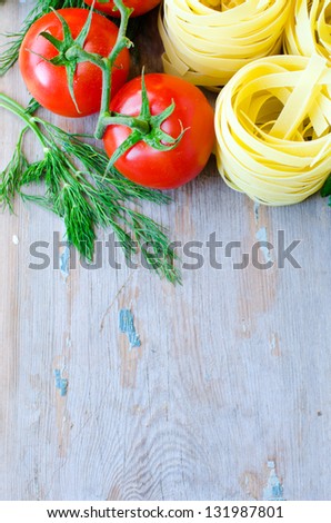 Wooden texture with tomatoes and paste