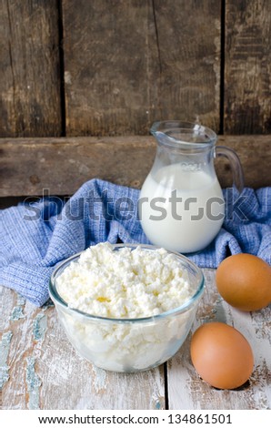Cottage cheese, milk and eggs.Selective focus