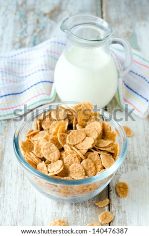 Corn flakes and milk . Breakfast