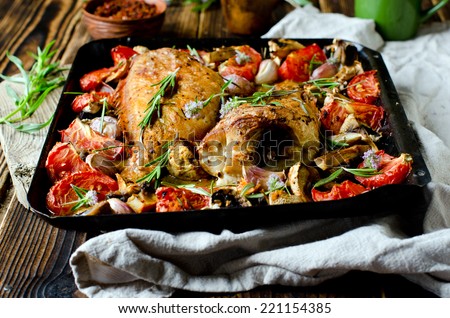 Baked sea bass with vegetables and herbs