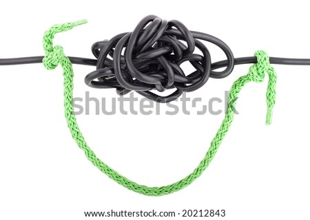 Tangled cable and tied rope isolated on white illustrating concept of finding simple solution to complex problem, stress, obstacle