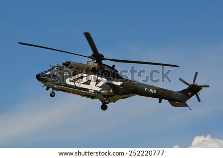 This is the Eurocopter AS 332 M1 Super Puma T-316 from the Swiss Air Force. Here we can see it at the air14 show in Payerne Switzerland on the 30th of August 2014.