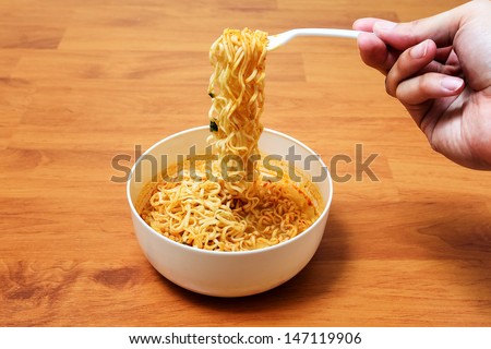 Instant noodles on wood baord