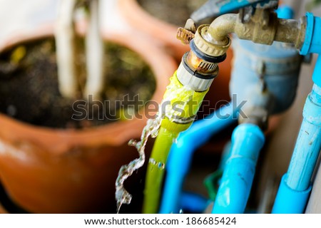 Wasting water - water leaking from water tap