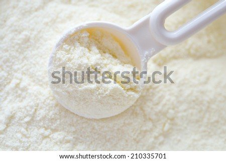 Powdered milk with spoon for baby