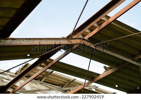 Heavy rain and storm damaged house roof in Thailand