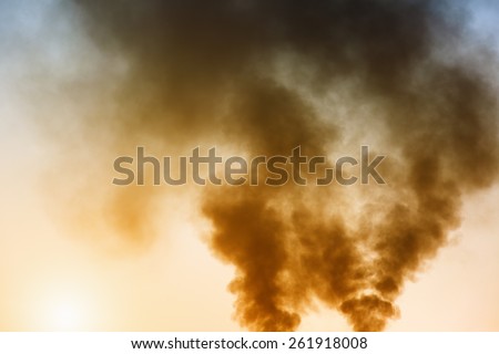 Air pollution by smoke coming out of factory