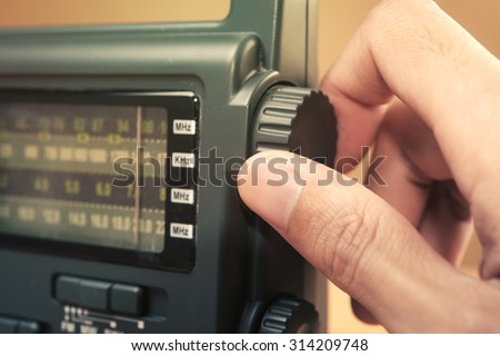 Hand tuning radio button