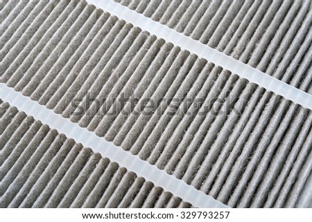 Used air conditioner filter isolated on white background