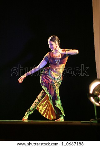 HYDERABAD,AP,INDIA-AUGUST 04:Bharatnatyam exponent Savitha sastry performs soul cages solo dance Theatre 0n August 04,2012 in Hyderabad,Ap,India.The life of the cosmos theme dance presentation.