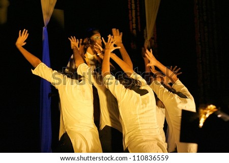 HYDERABAD,AP,INDIA-AUGUST 16 :Actors perform The last colour, marathi play  about tiger population in Abhinaya National Theatre Festival 2012, on August 16,2012 in Hyderabad,India.Save tiger theme.
