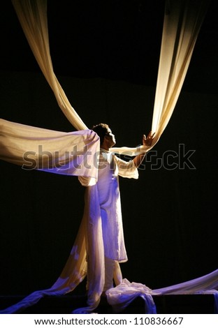 HYDERABAD,AP,INDIA-AUGUST 16 :Actors perform The last colour, marathi play  about tiger population in Abhinaya National Theatre Festival 2012, on August 16,2012 in Hyderabad,India.Save tiger theme.