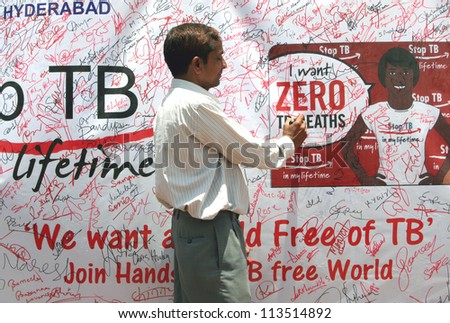SECUNDERABAD,AP,INDIA-JUNE 05:Local Tuberculosis awareness activists campaign during  visit of Red Ribbon Express  Indian Railways AIDS/HIV awareness campaign on June 05,2012 in Secunderabad,Ap,India.