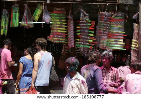 HYDERABAD,AP,INDIA-MARCH 17: Indian hindus shopping to celebrate Holi festval on March 17,2014 in Hyderabad,Ap,India. A  traditional Spring festival also known as  festival of colours.