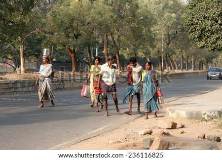 HYDERABAD,INDIA-FEBRUARY 2: Indian poor  Manual labour or construction workers on their way for work in Hyderabad,India on February 2,2012.