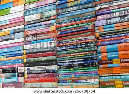 HYDERABAD,INDIA-APRIL 3:Street seller sell second hand books on various subjects on April 3,2015 in Hyderabad,India.Common scene through out the year in busy streets.