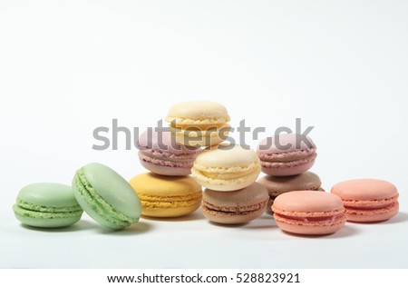 Sweet and colourful french macaroons, macaron on white background, pastel color, french cuisine