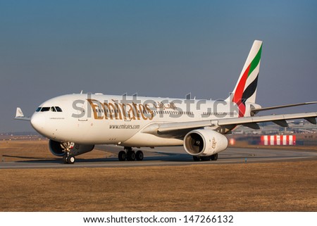 PRAGUE - FEBRUARY 26: Emirates Airbus A330 airliner taxes for take off on February 26, 2011 in Prague,Czech Republic. Emirates is rated as a top 10 best airlines in the world flying on youngest fleet.