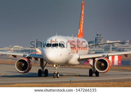 PRAGUE - FEBRUARY 26: Easy Jet Airbus A319 airliner taxes for take off on February 26, 2011 in Prague,Czech Republic. Easyjet is the second largest low-cost airline of Europe after Ryanair.