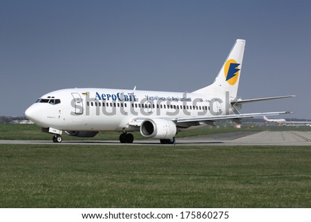 PRAGUE - APRIL 12: Aerosvit Boeing 737-5L9 taxi to takes off from PRG Airport on April 12,2009. The company Aerosvit had 20 aircraft Boeing-737