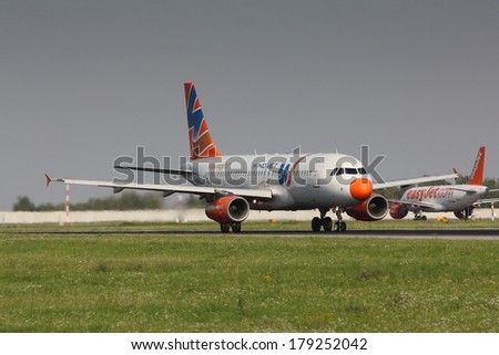 PRAGUE, CZECH REPUBLIC - AUGUST 19: Aircraft operated by Wind Jet, take off PRG in Prague on Augutst 19, 2011. On 11 August 2012, the airline has ceased operations.