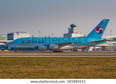 PRAGUE - MARCH 14: A380 Korean Air taxi after landing to terminal PRG in Prague, CZE on March 14, 2014.  Blue top livery was introduced on in 1984. Airlines are flag carrier of South Korea