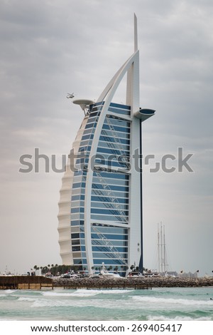 DUBAI, UAE - MARCH 27 2015 : Burj Al Arab, One of the most famous landmark of United Arab Emirates. Picture taken during cloudy weather on March 27, 2015.