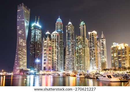 DUBAI, UAE - APRIL 1: Modern buildings in Dubai Marina, Dubai, UAE. Part of city with artificial channel length of 3 kilometers along the Persian Gulf, taken on 1 April, 2015.