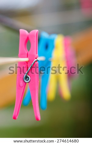 Clothespins on cord after rain on spring