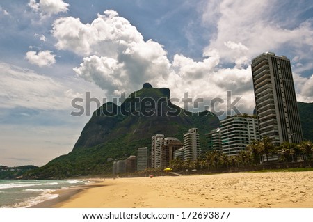 Beautiful Tropical Beach Landscape, Mountains, Luxury Buildings in Sao Conrado Beach, Rio de Janeiro, Brazil