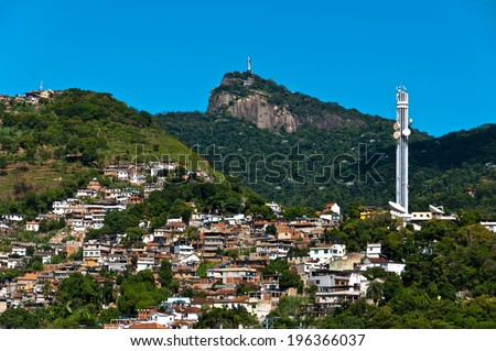 Rio de Janeiro Mountains with Slums and Corcovado with Christ the Redeemer statue.