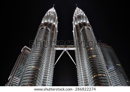 KUALA LUMPUR, MALAYSIA - 7 OCTOBER 2012: Petronas Twin Towers at night. Petronas Towers are twin skyscrapers and were tallest buildings in the world until 2004.