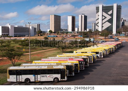 BRASILIA, BRAZIL - JUNE 6, 2015: Row of buses in the central bus station of Brasilia. The city was planned