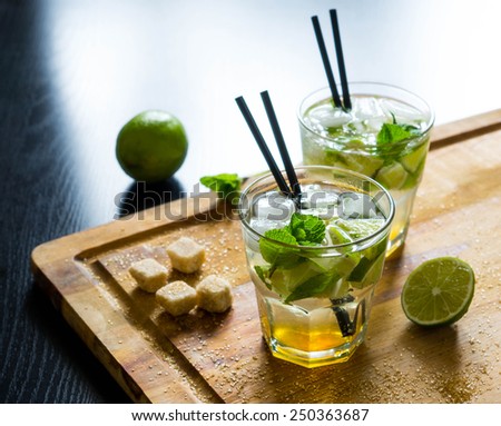 Fresh mojito drink on the wooden table