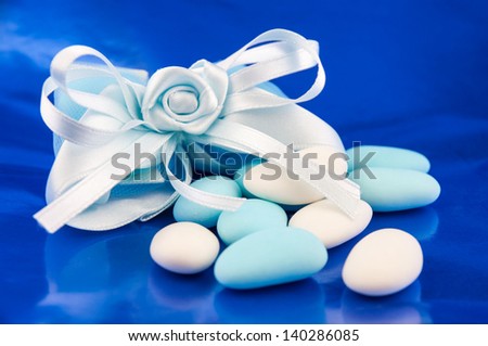 Blue and White Wedding Sugared AlmondsBlue and white sugared almonds on a blue background