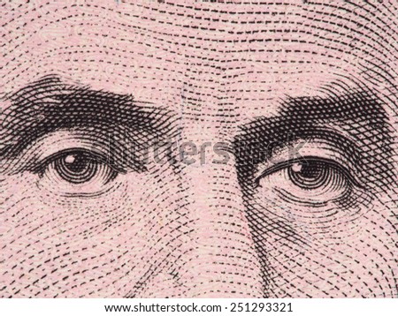 President Abraham Lincoln eyes super macro on US five dollar bill, USA money closeup, 2013 series