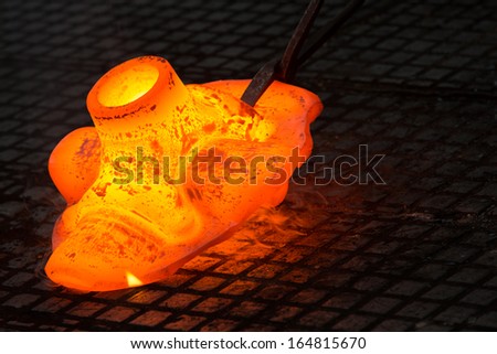 a glowing iron ingot on the floor