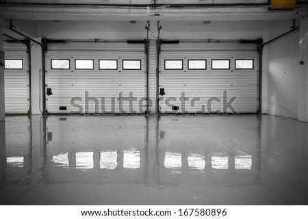 an auto motor speedway garage, interior, windows