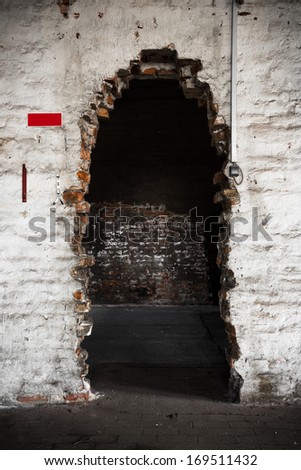 An old brick wall of the door frame